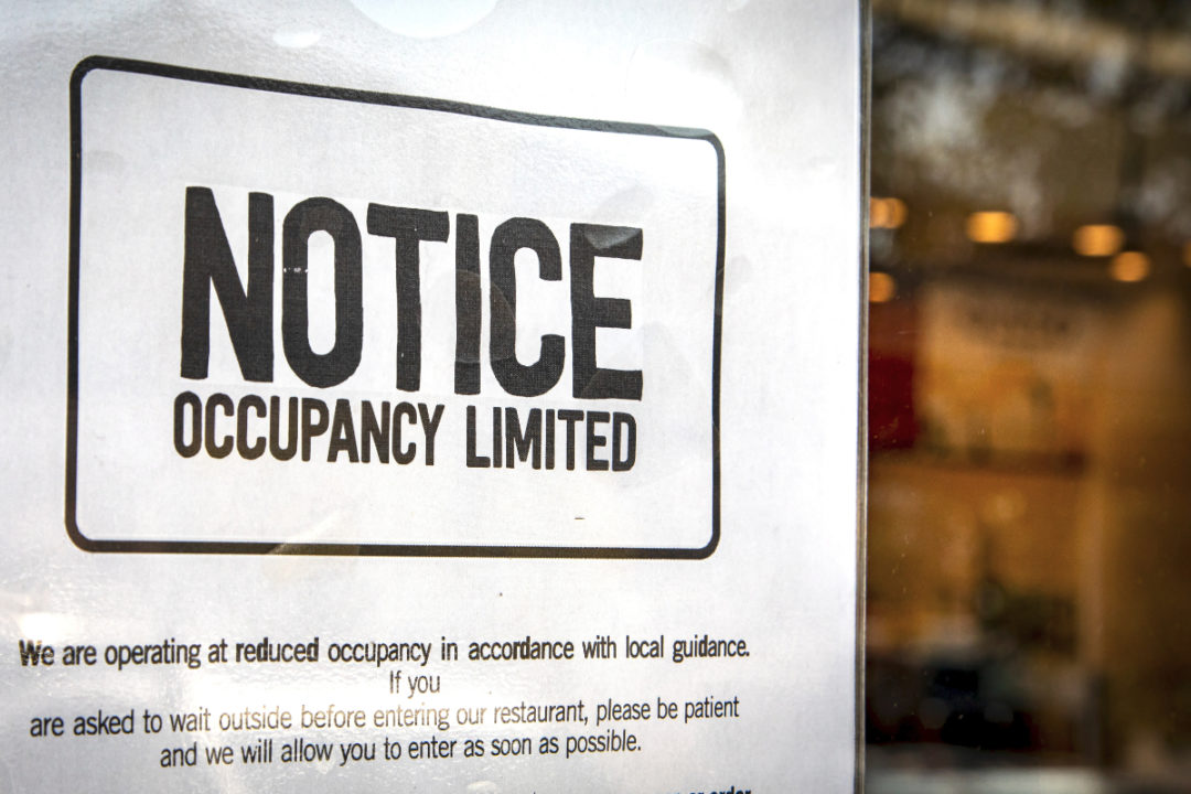 Restaurants limited occupancy due to coronavirus sign